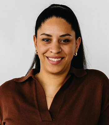 Natalya smiling for the camera