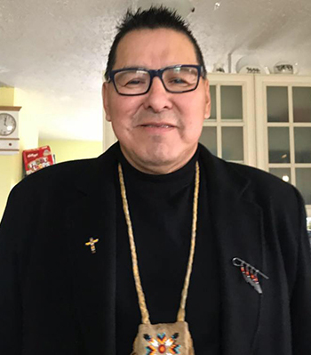 Grant smiling for the camera