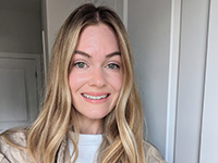 Sarah Zdunich. A white woman with long blonde hair.