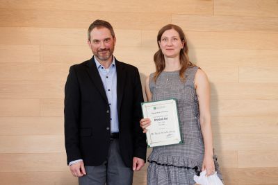 Dr. Schellenberg receives award.